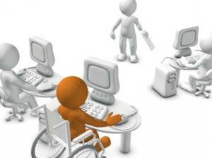Disegno stilizzato di alcuni lavoratori che usano il computer, uno di essi ha una disabilità motoria.