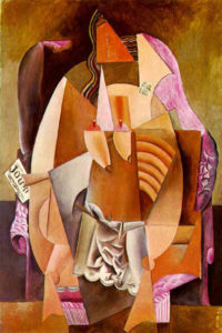 Pablo Picasso, Donna con camicia in poltrona, olio su tela, 1913, collezione Ganz, New York. L’opera raffigura una donna nuda e seduta su una poltrona molto grande che la contiene e, in qualche modo, la avvolge. La donna è scomposta in forme geometriche che si affiancano e si sovrappongono, nello stile proprio del Cubismo sintetico. In uno dei riquadri, il drappeggio di una camicia.